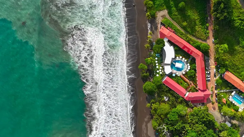 Aerial view of the hotel next to the beach