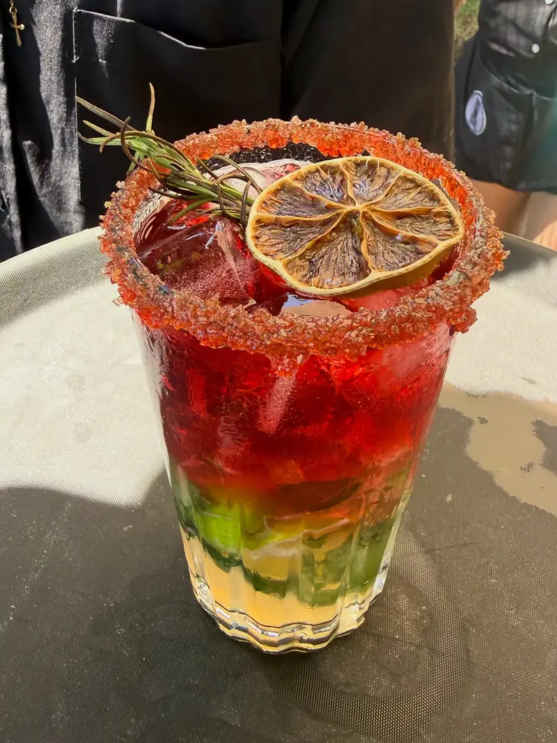 House cocktail with a sugared rim and dehydrated citrus garnish, served at Vida Hermosa