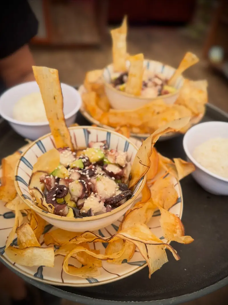 Ceviche served with plantain chips and rice, one of Vida Hermosa's signature dishes